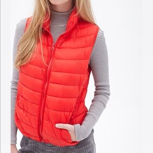 Orange puffer bubble vest